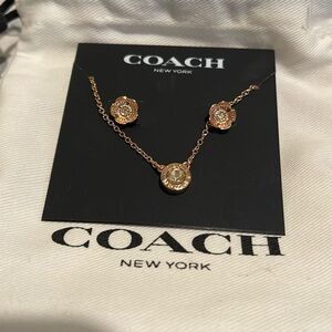 Coach rose gold earring and necklace set